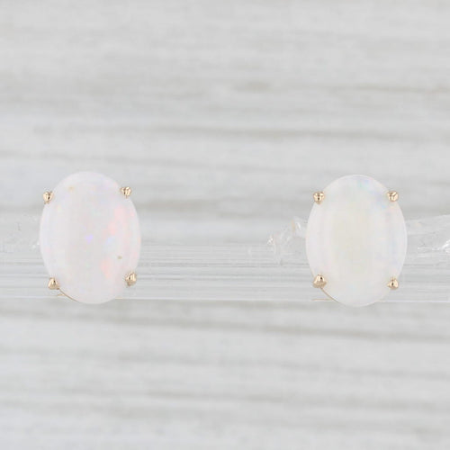 Light Gray Oval Cabochon Opal Stud Earrings 14k Yellow Gold Solitaire Studs