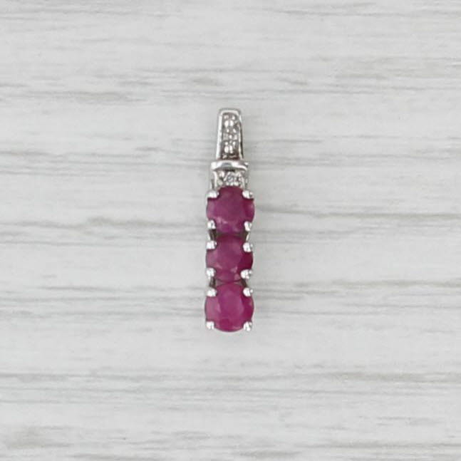 1.15ctw Ruby 3-Stone Journey Pendant 10k White Gold Diamond Accents
