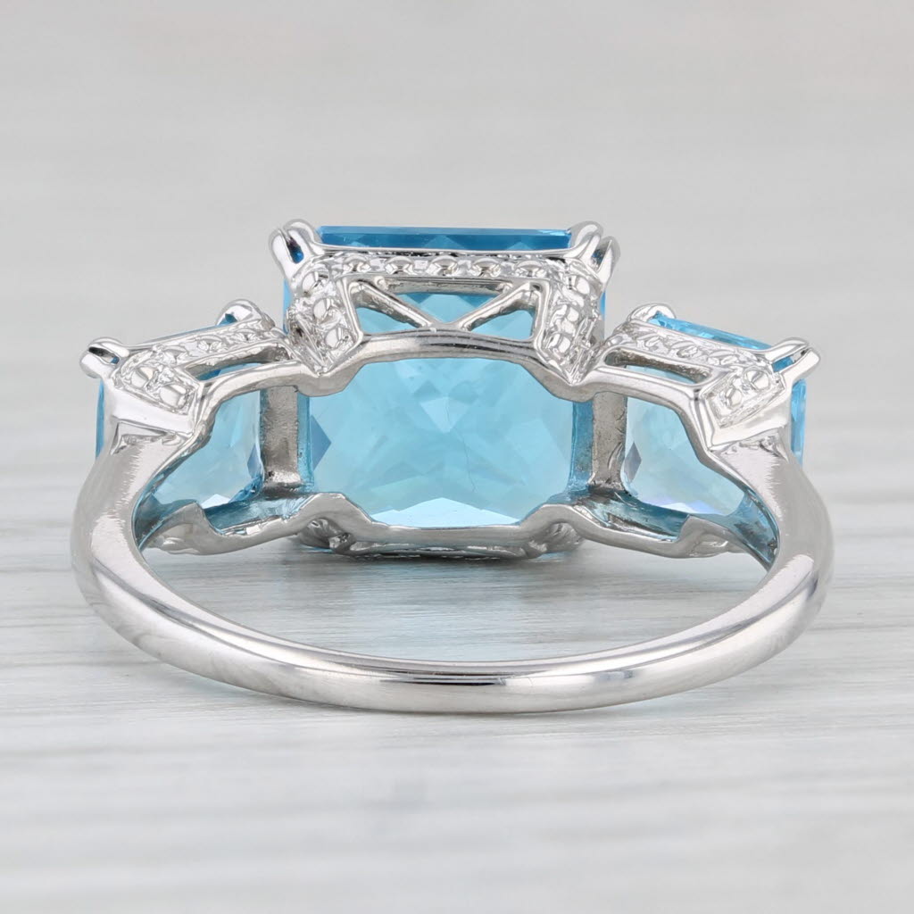 Light Gray 6.37ctw Blue Topaz 3-Stone Ring 10k White Gold Size 7 Diamond Accents