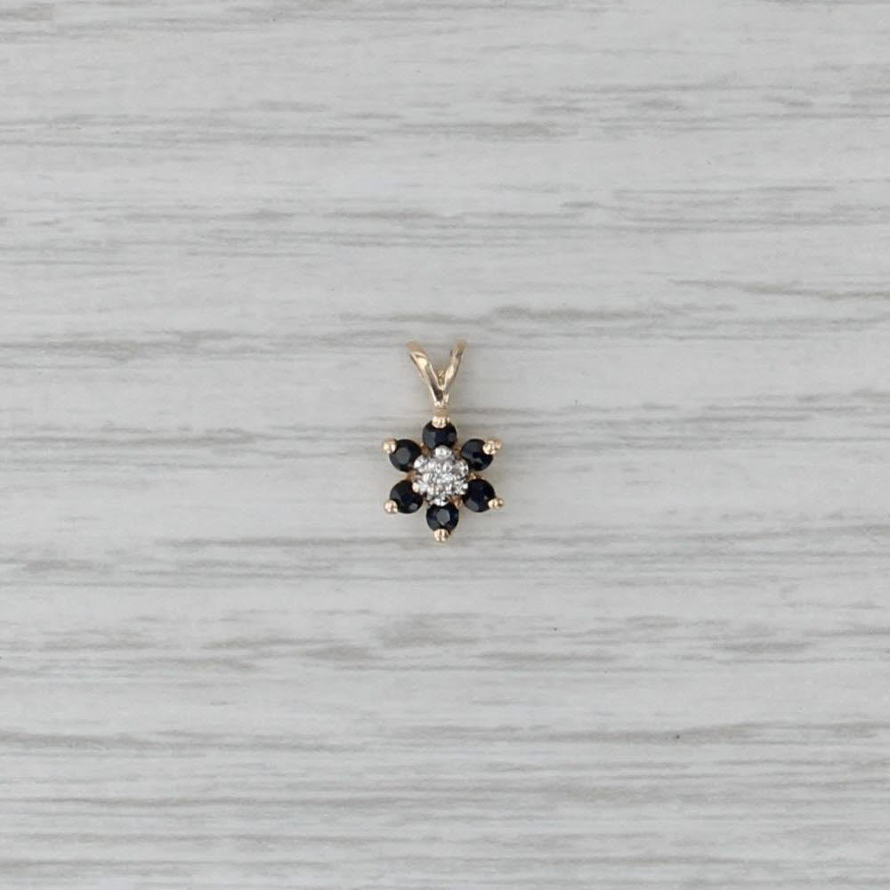 Small 0.20ctw Blue Sapphire Flower Pendant 10k Yellow Gold Diamond Accent
