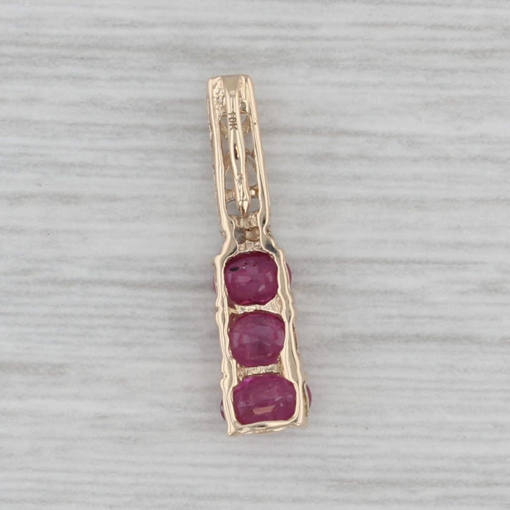 Gray 0.68ctw Ruby 3-Stone Journey Pendant 10k Yellow Gold