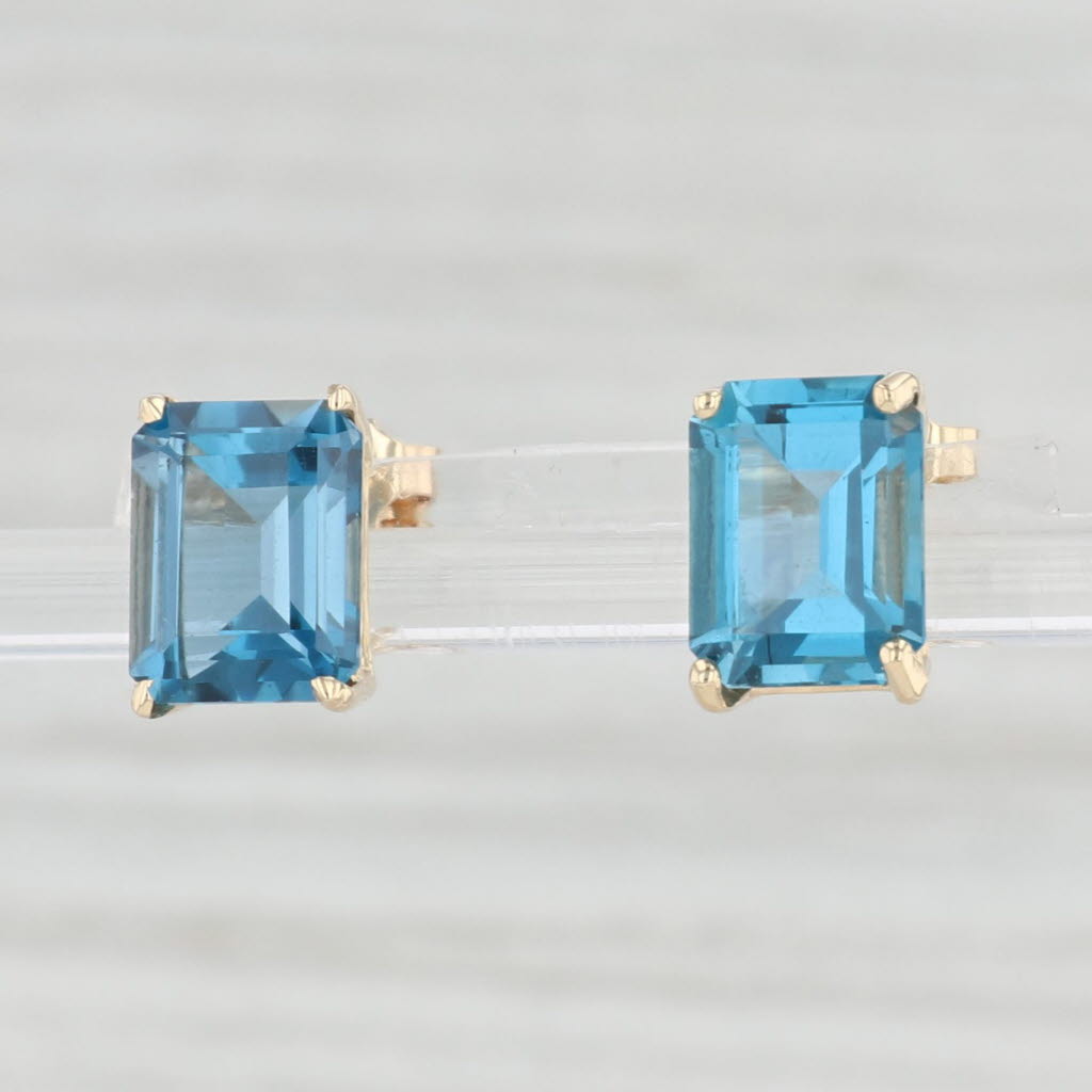 Light Gray 6ctw London Blue Topaz Solitaire Stud Earrings 14k Yellow Gold Emerald Cut Studs