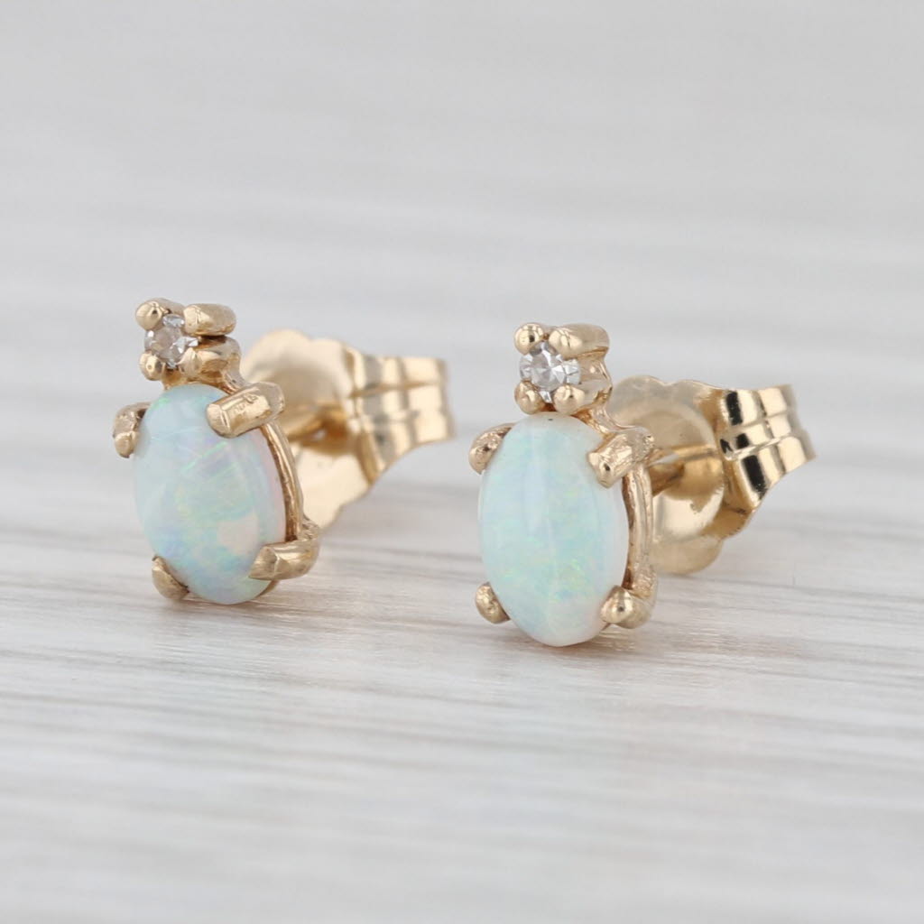 Oval Cabochon Opal Stud Earrings 10k Yellow Gold Diamond Accents