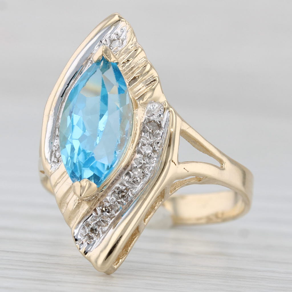 Light Gray 3.82ctw Marquise Blue Topaz Bypass Ring 14k Gold Diamond Accents Size 10.25