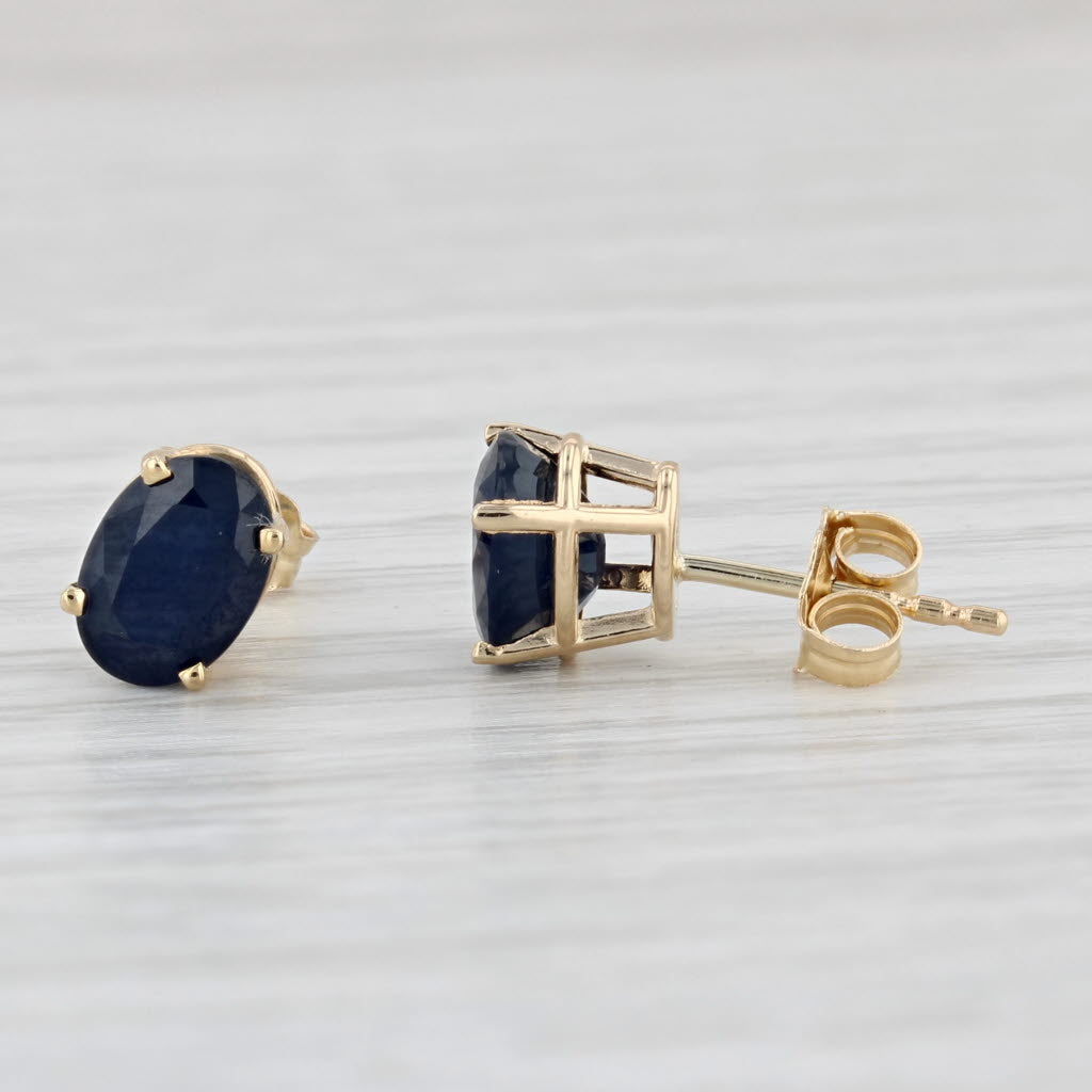 Light Gray 2ctw Blue Sapphire Stud Earrings 14k Yellow Gold Oval Solitaires