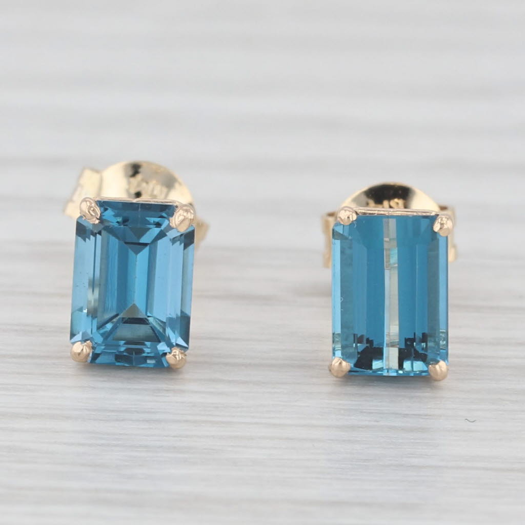 Light Gray 2.60ctw London Blue Topaz Stud Earrings 14k Yellow Gold Emerald Cut Solitaires