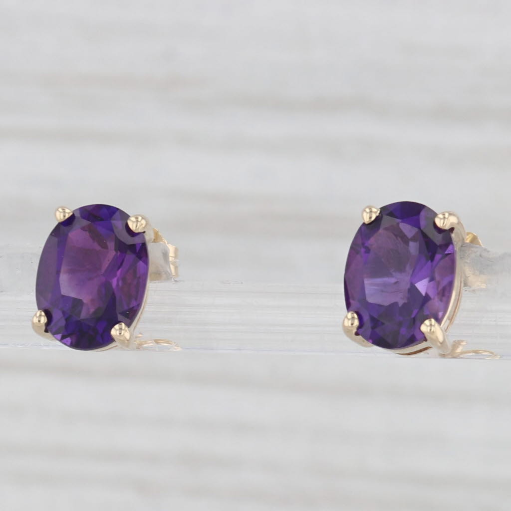 Light Gray 2.20ctw Oval Solitaire Amethyst Stud Earrings 14k Yellow Gold