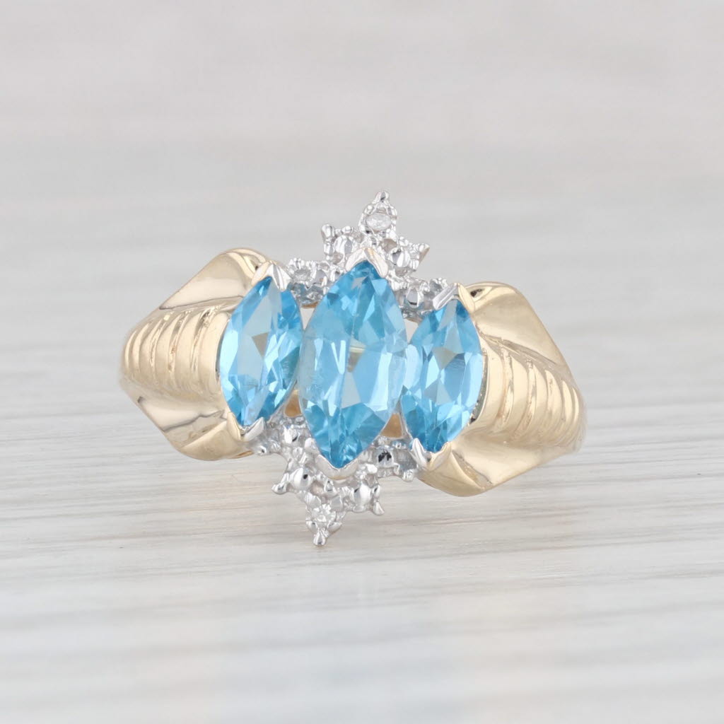 Light Gray 1.25ctw 3-Stone Blue Topaz Diamond Ring 10k Yellow Gold Size 7.25