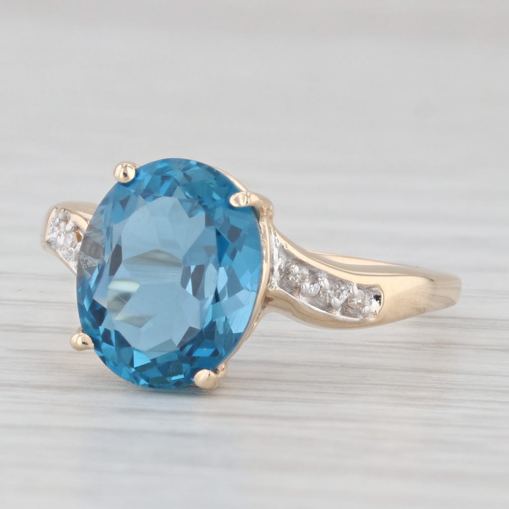 Light Gray 4.67ct Oval Blue Topaz Diamond Bypass Ring 14k Yellow Gold Size 9