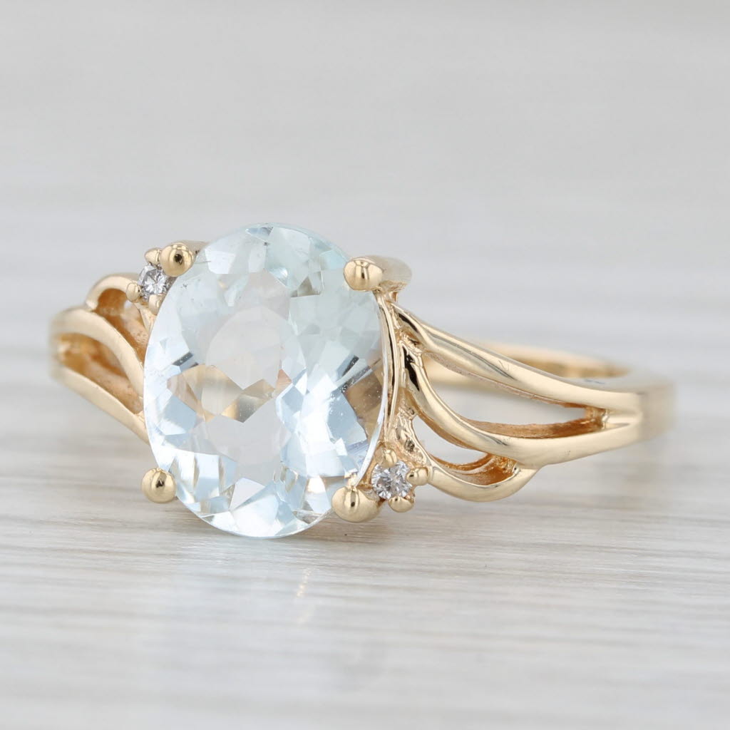 Light Gray 1.87ctw Oval Aquamarine Solitaire Ring 10k Yellow Gold Diamond Accents Size 7