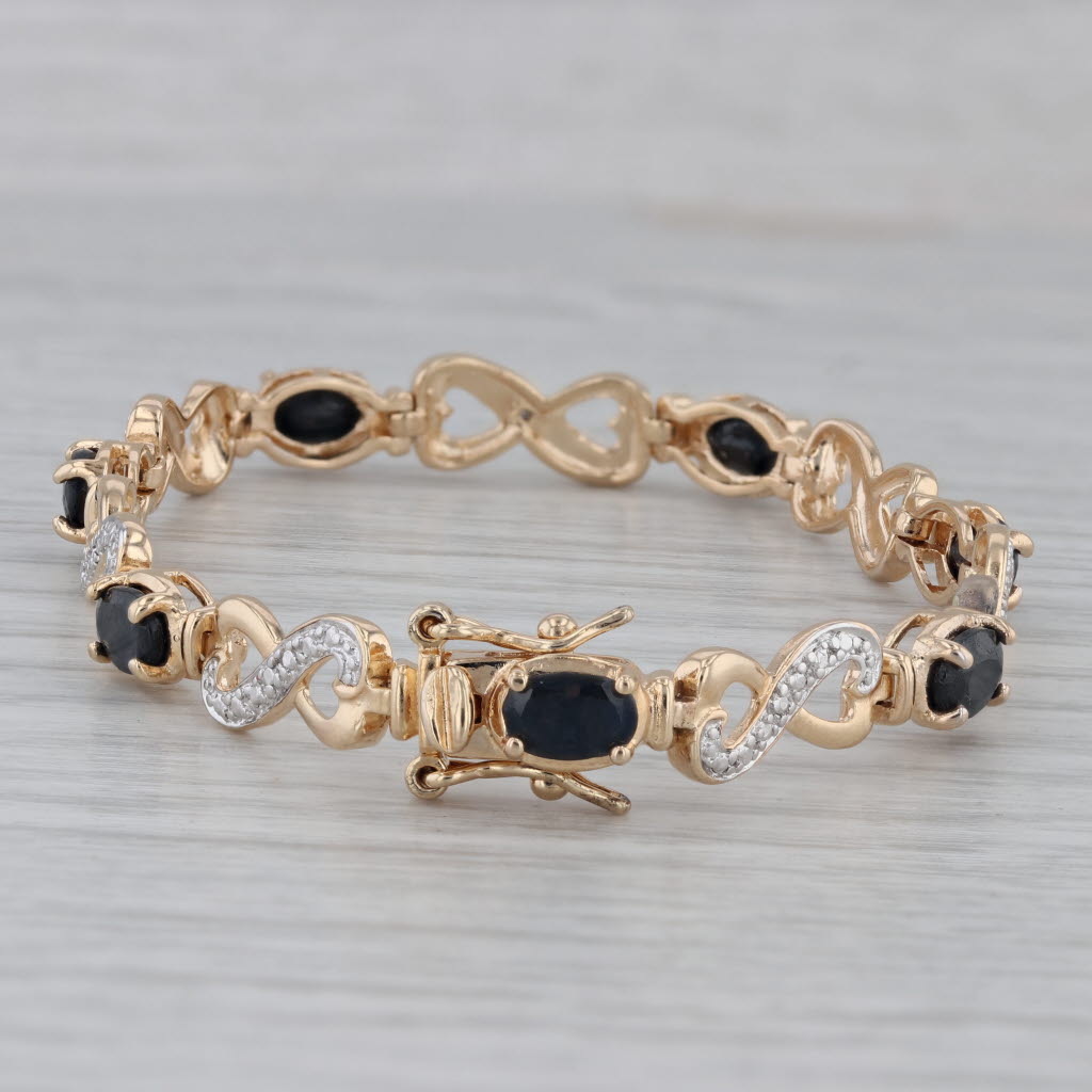 Gray 4.80ctw Blue Sapphire Bracelet Sterling Silver Gold Plated Diamond Accents 6.25"