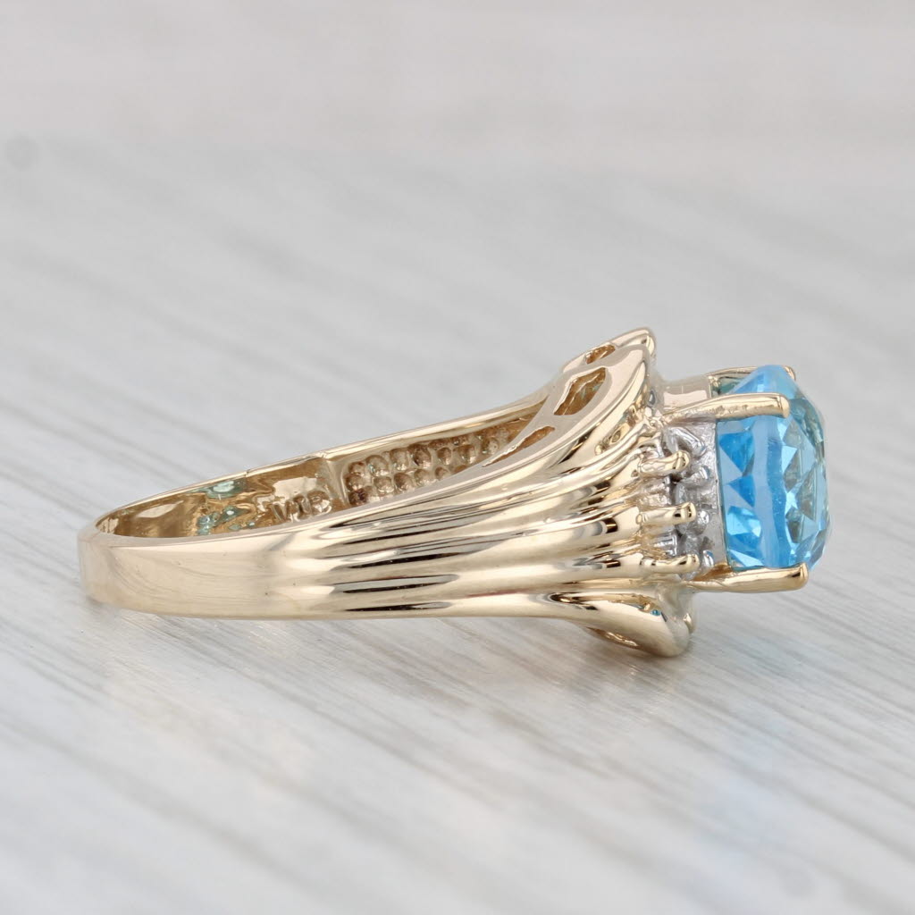 Light Gray 3.39ctw Oval Blue Topaz Diamond Ring 10k Yellow Gold Size 7