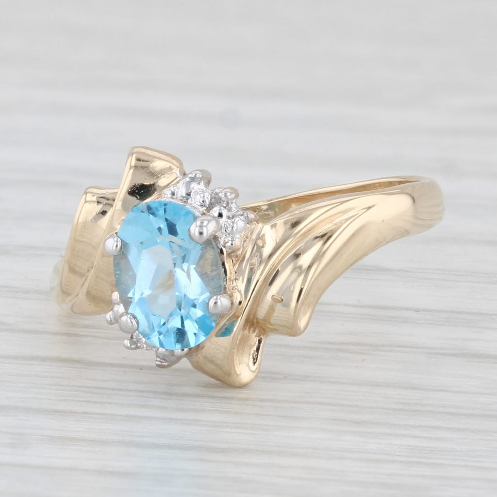 Light Gray 1ctw Oval Blue Topaz Diamond Ring 10k Yellow Gold Size 7.25