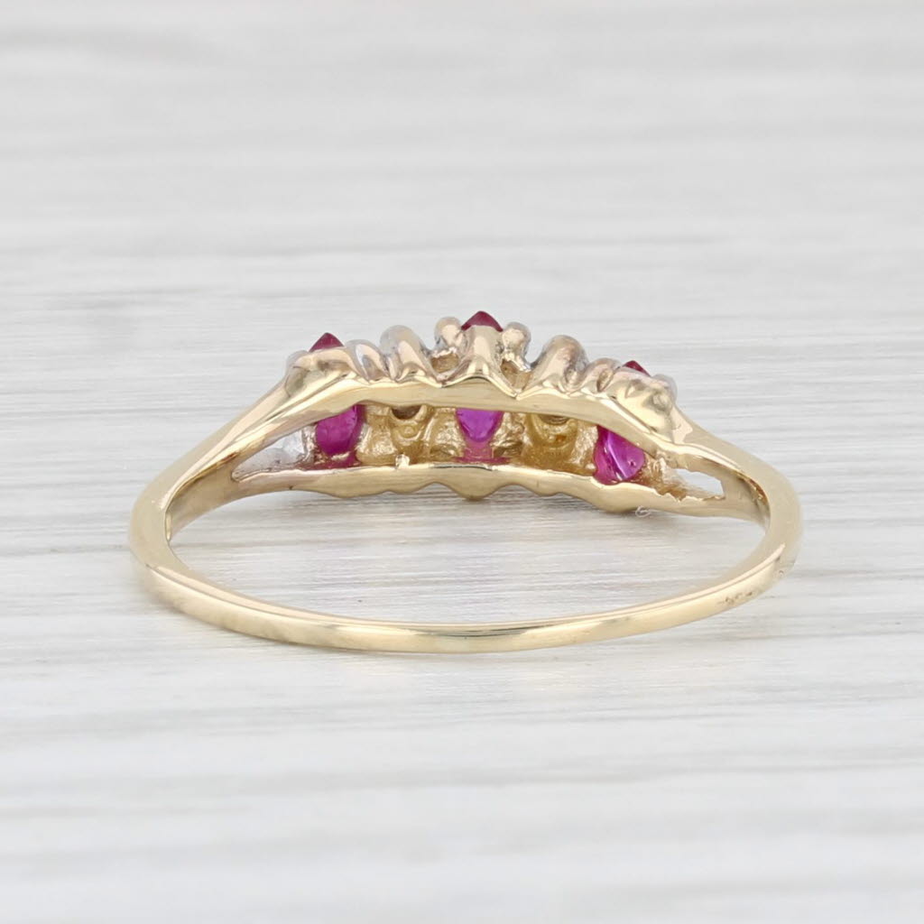 Light Gray 0.30ctw Marquise Ruby 3-Stone Ring 10k Yellow Gold Size 5.25 Diamond Accents