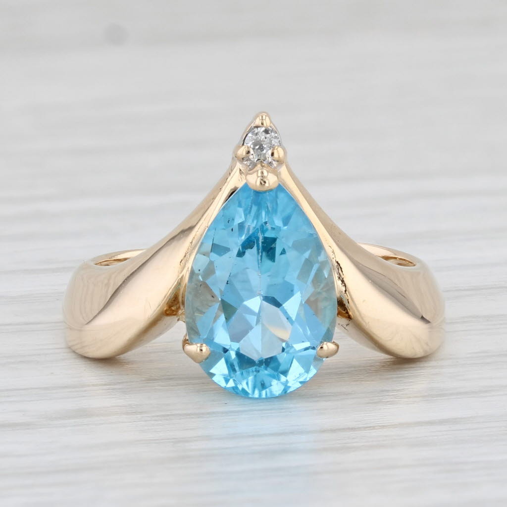 Light Gray 3.97ctw Pear Blue Topaz Diamond Ring 14k Yellow Gold Size 7.75