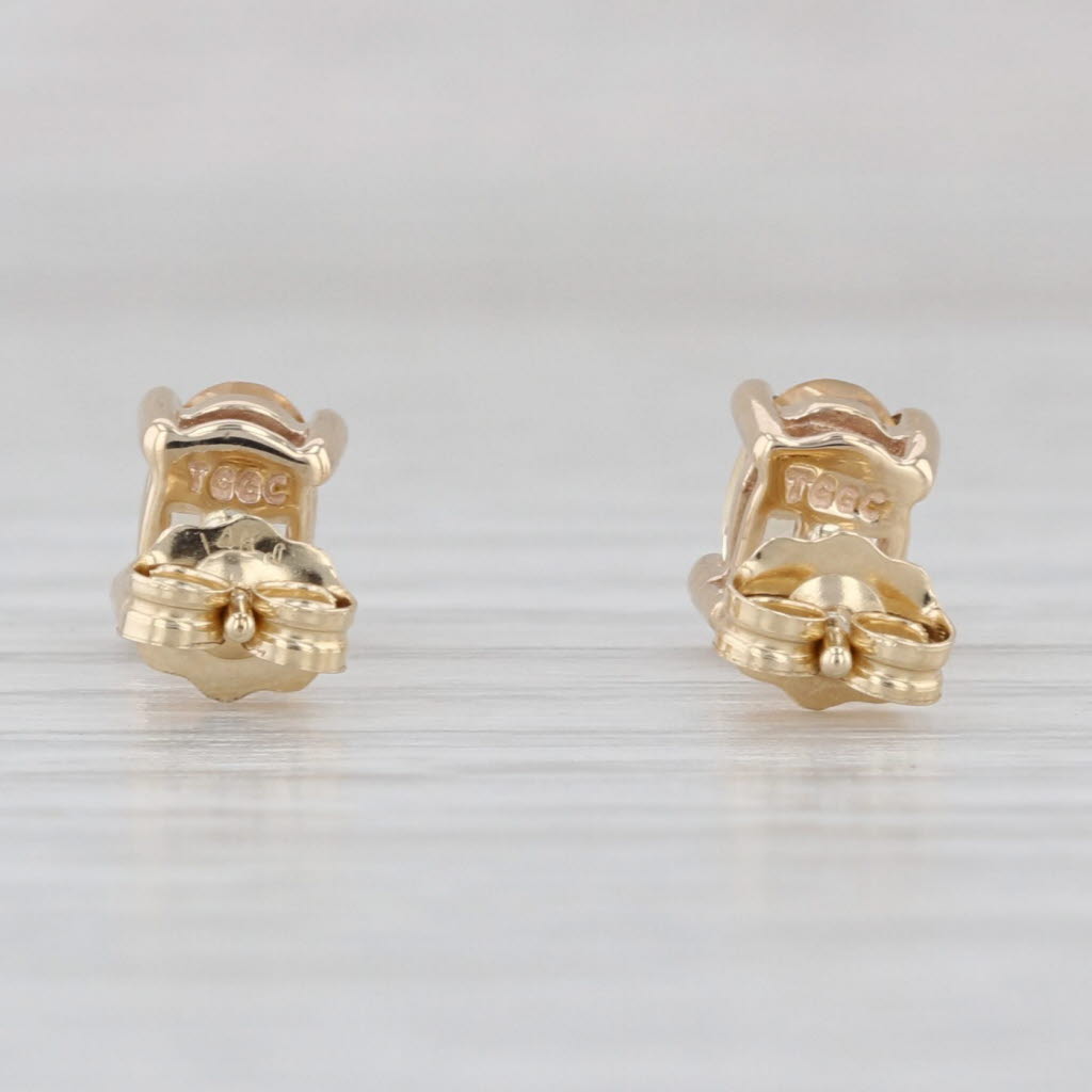 1.07ctw Yellow Topaz Stud Earrings 10k Yellow Gold Oval Solitaire Studs