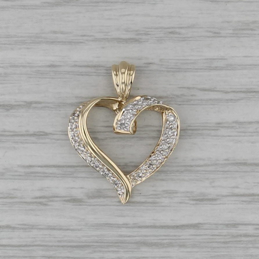 0.14ctw Diamond Accented Open Heart Pendant 10k Yellow White Gold