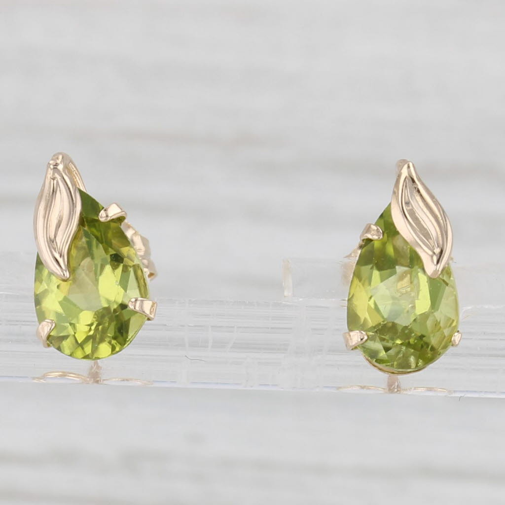 Light Gray 1.80ctw Peridot Pear 10k Yellow Gold Stud Earrings