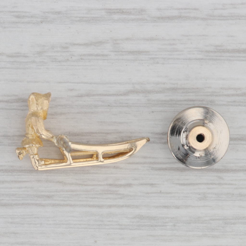 Gray Vintage Figure Pushing Sled Pin 10k Yellow Gold Alaskan