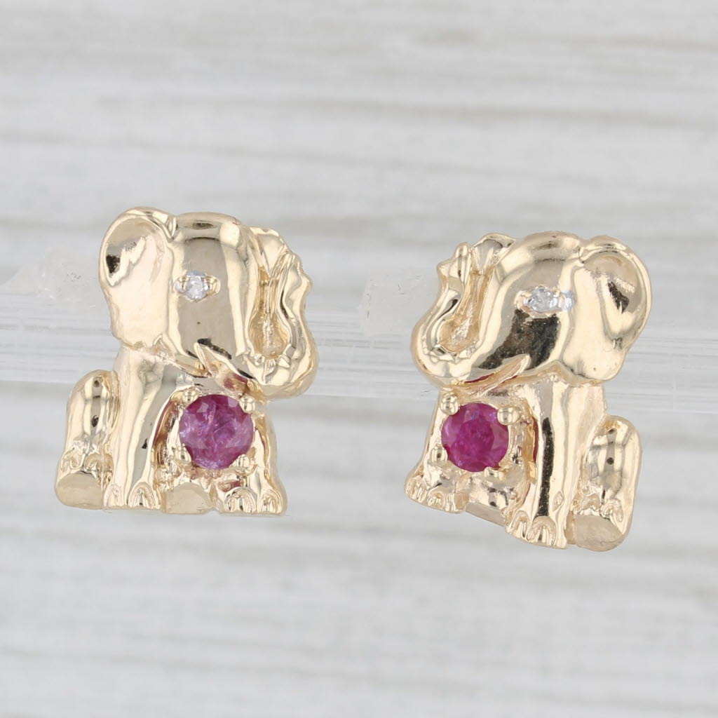 Light Gray 0.28ctw 0.25ctw Ruby Diamond Elephant Stud Earrings 10k Yellow Gold