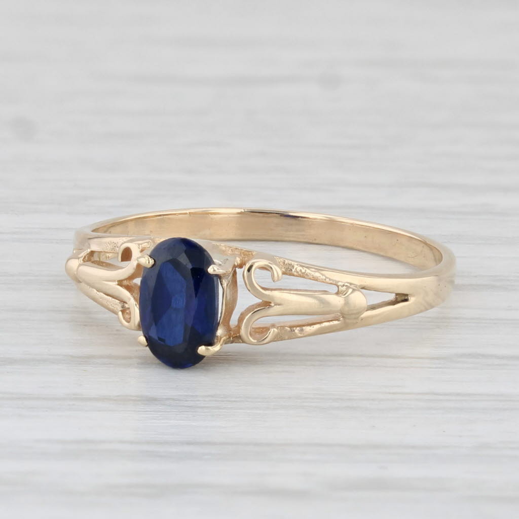 Light Gray 0.57ct Lab Created Oval Blue Sapphire Solitaire Ring 14k Yellow Gold Size 6.25