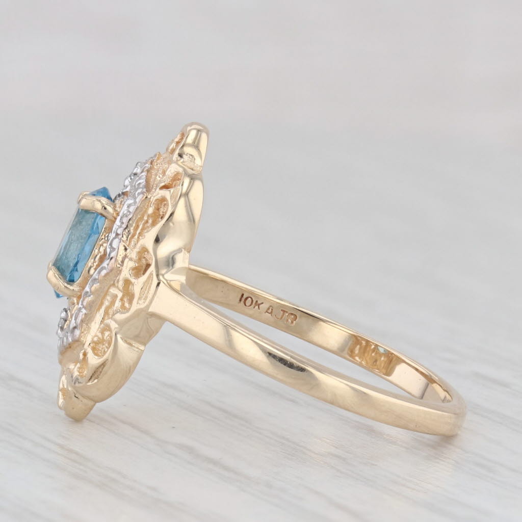 Light Gray 0.60ct Oval Blue Topaz Ring 10k Yellow Gold Size 6 Diamond Accents