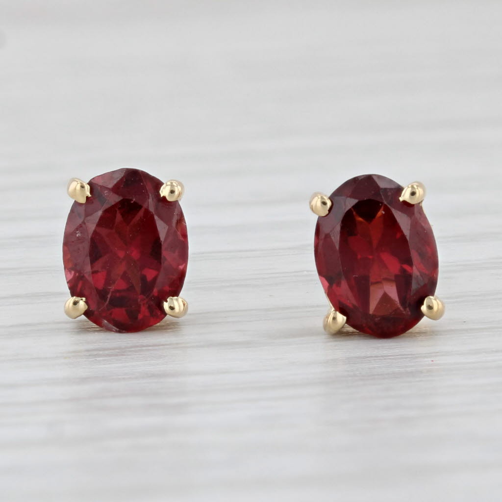 Light Gray 2.40ctw Rhodolite Garnet Stud Earrings 14k Yellow Gold Oval Solitaires