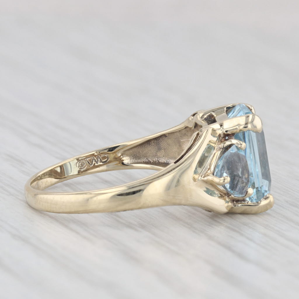 Light Gray 5.50ctw Emerald Cut Blue Topaz Ring 10k Yellow Gold Size 7