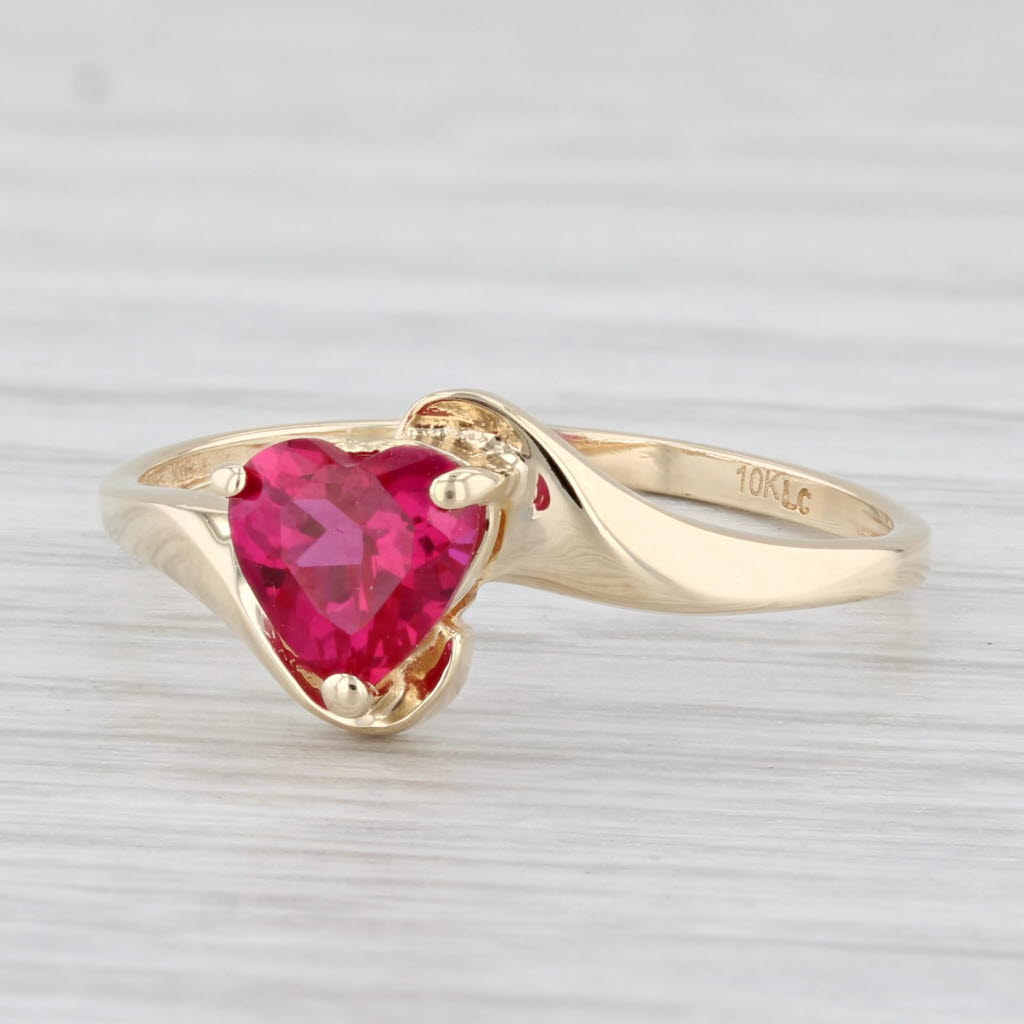 Light Gray 0.70ct Lab Created Ruby Heart Ring 10k Yellow Gold Bypass Size 8