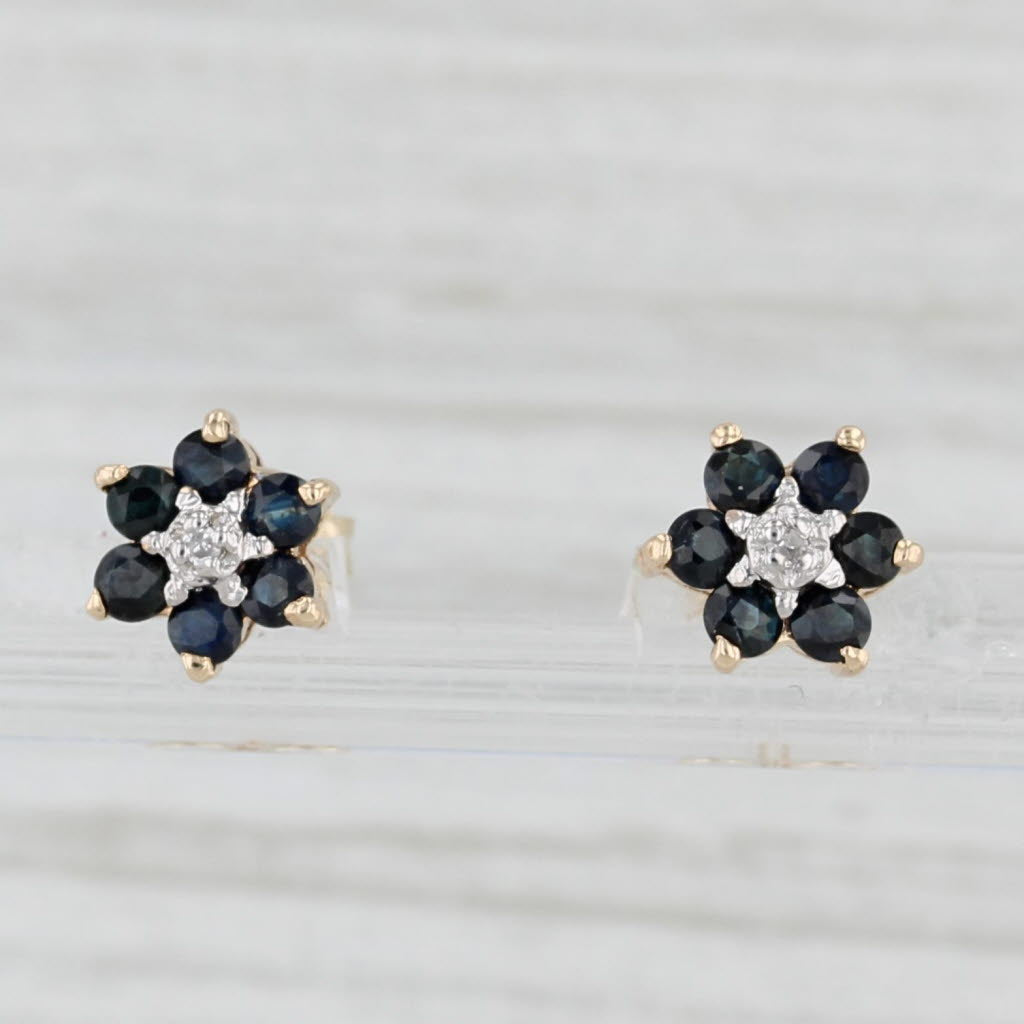 Light Gray 0.56ctw Blue Sapphire Flower Stud Earrings 10k Yellow Gold Diamond Accents