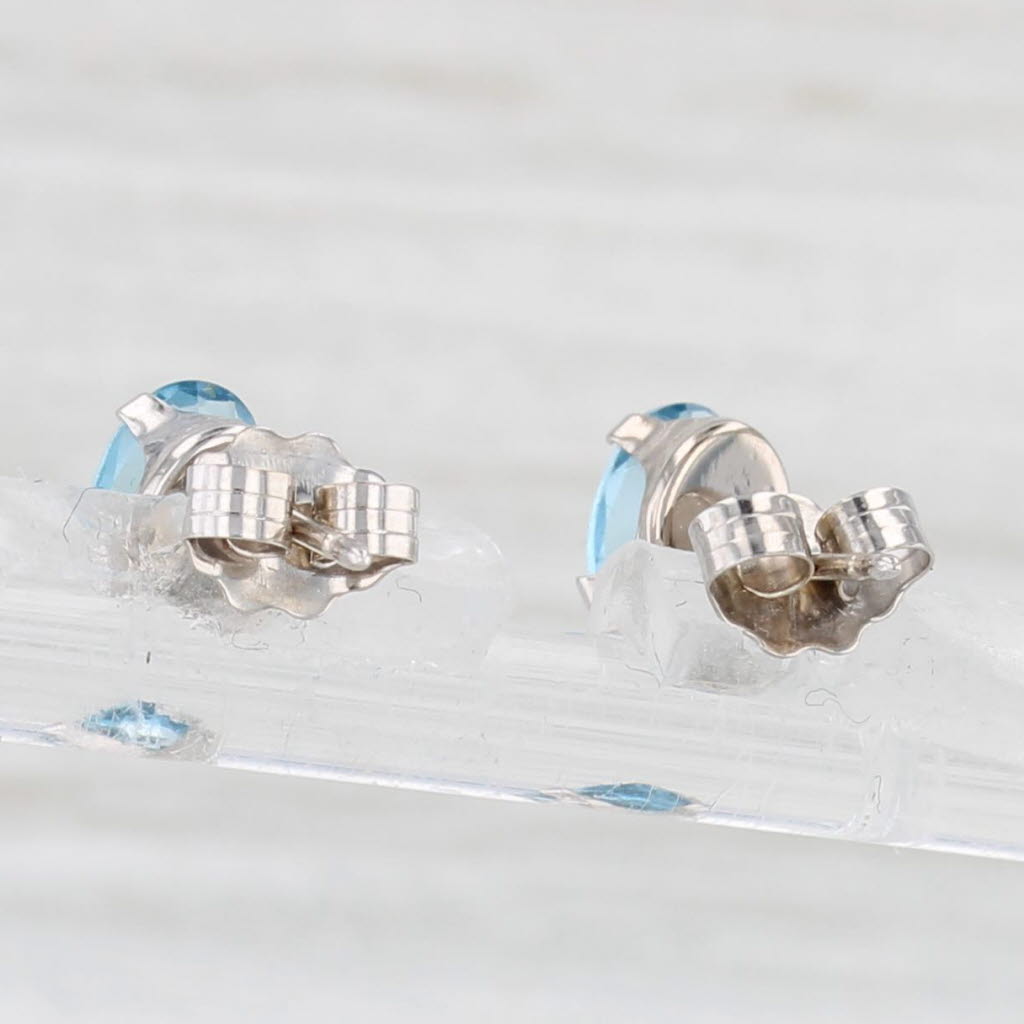 Light Gray 1.10ctw Blue Topaz Stud Earrings 14k White Gold Oval Solitaire Studs