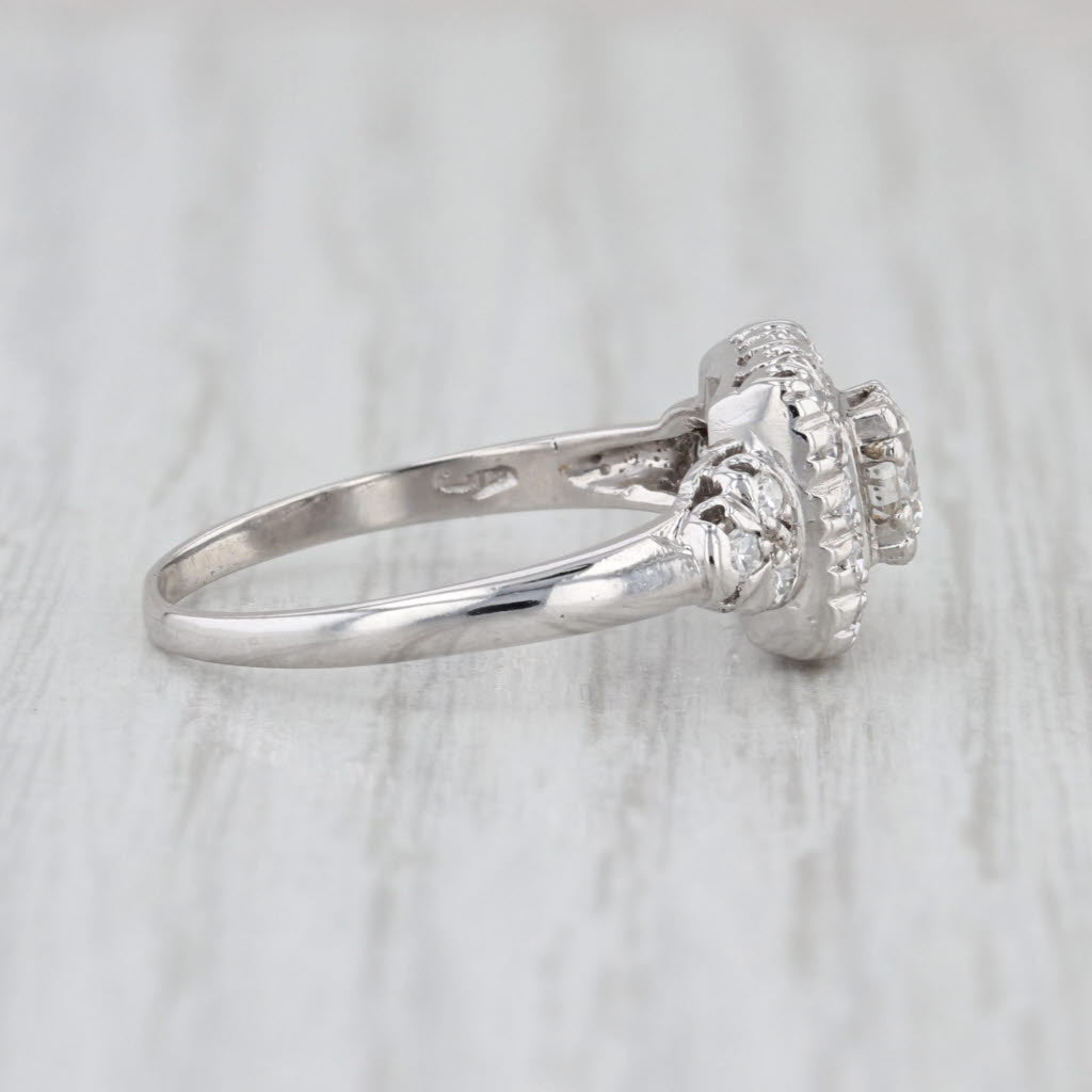 Vintage 0.70ctw Round Diamond Halo Engagement Ring Platinum Size 7.5