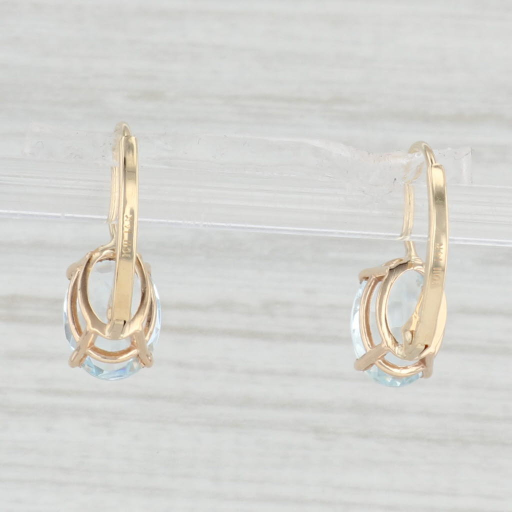 Light Gray 3ctw Oval Aquamarine Earrings 14k Yellow Gold Leverback Drops