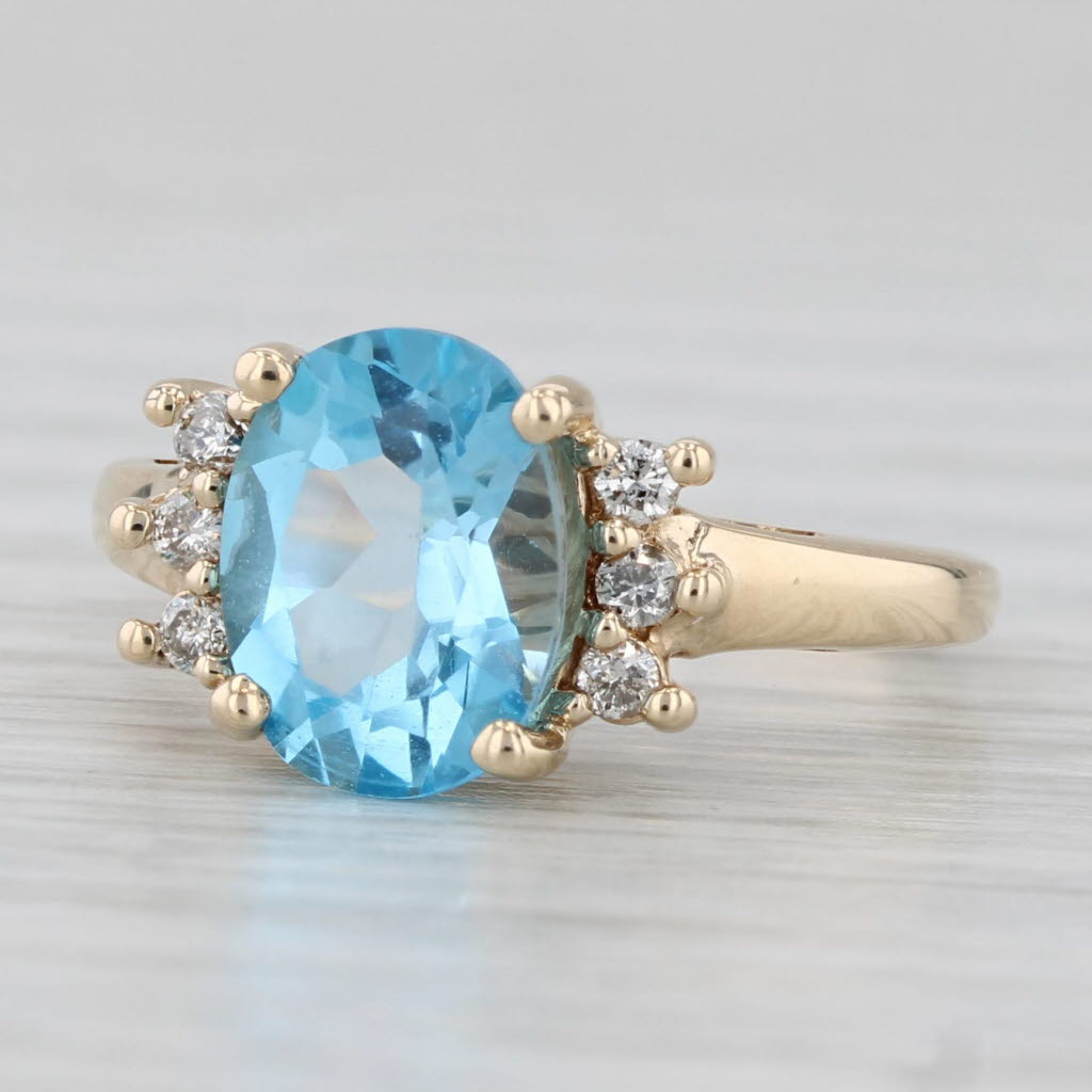 Light Gray 2.19ctw Oval Blue Topaz Diamond Ring 10k Yellow Gold Size 4.5