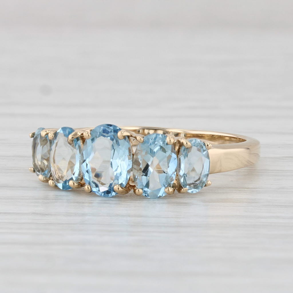 Light Gray 2ctw Graduated Aquamarine Ring 14k Yellow Gold Size 8.25