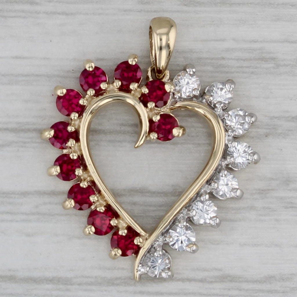 Gray 1.14ctw Lab Created Ruby White Topaz Open Heart Pendant 10k Yellow Gold