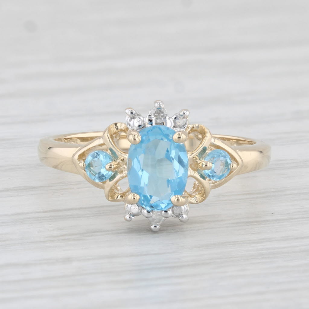 Light Gray 1.02ctw Oval Blue Topaz Diamond Ring 14k Yellow Gold Size 7