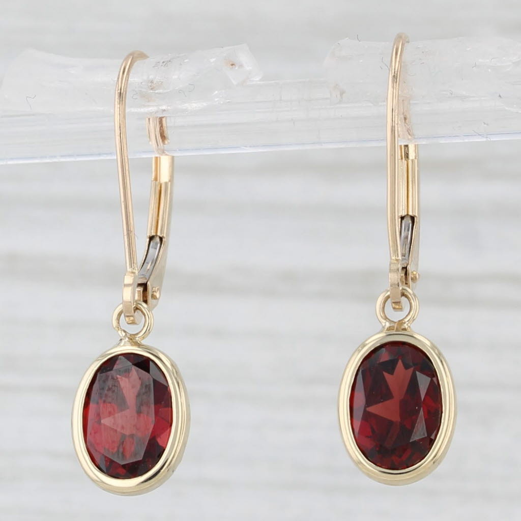 Light Gray 1.80ctw Oval Garnet Drop Earrings 14k Yellow Gold Lever Backs