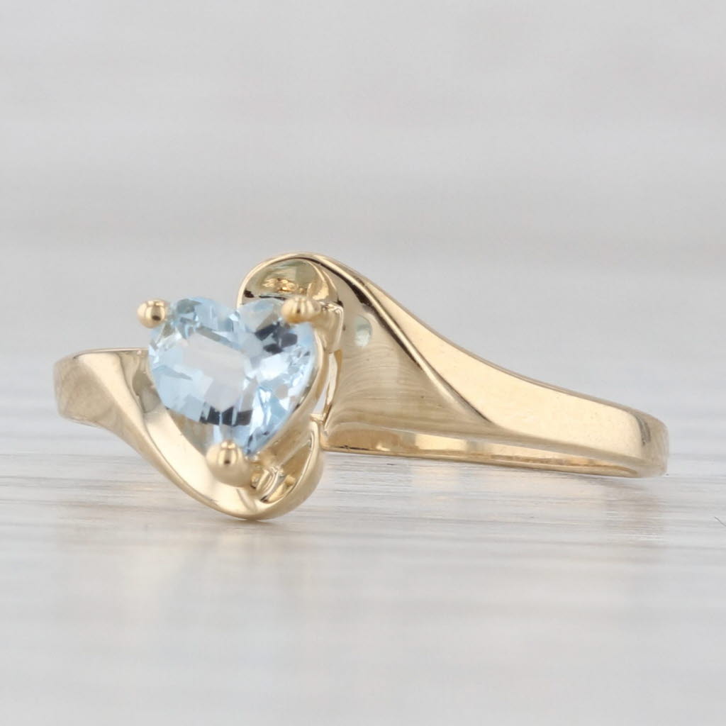 Light Gray 0.38ct Aquamarine Heart Bypass Ring 10k Yellow Gold March Birthstone Size 6.5