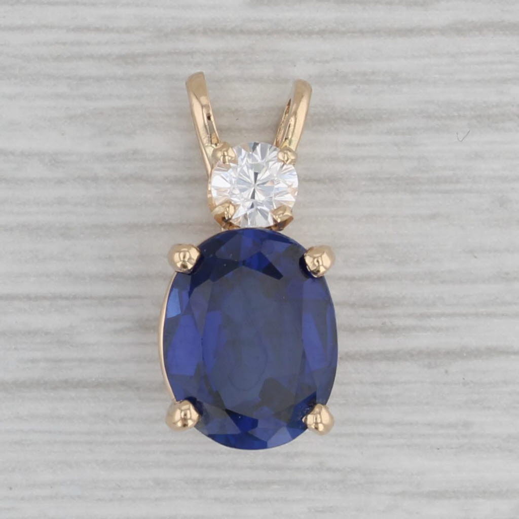 Gray 2.98ctw Lab Created Blue Sapphire Cubic Zirconia Pendant 14k Yellow Gold