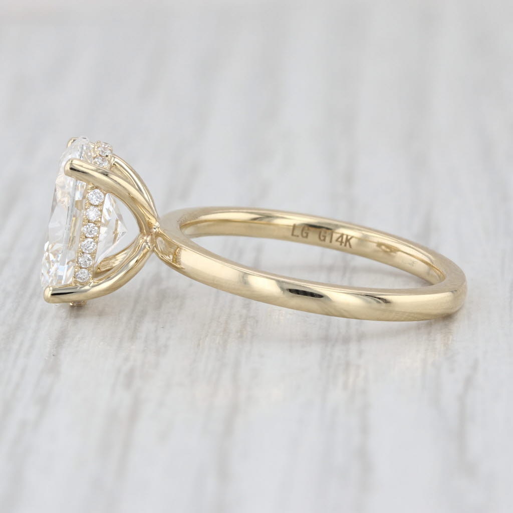 New IGI 3.09ctw Oval Halo Lab Grown Diamond Engagement Ring 14k Yellow Gold