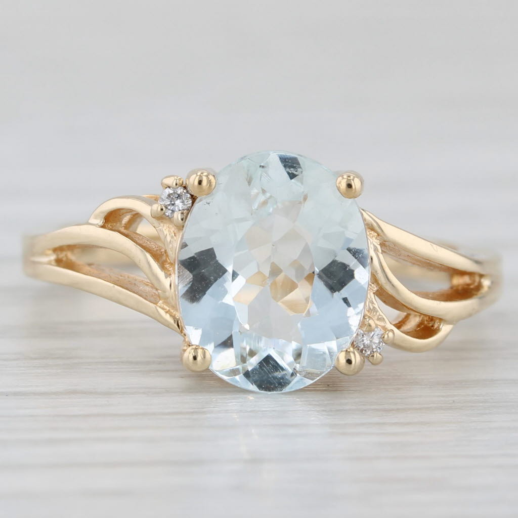 Light Gray 1.87ctw Oval Aquamarine Solitaire Ring 10k Yellow Gold Diamond Accents Size 7