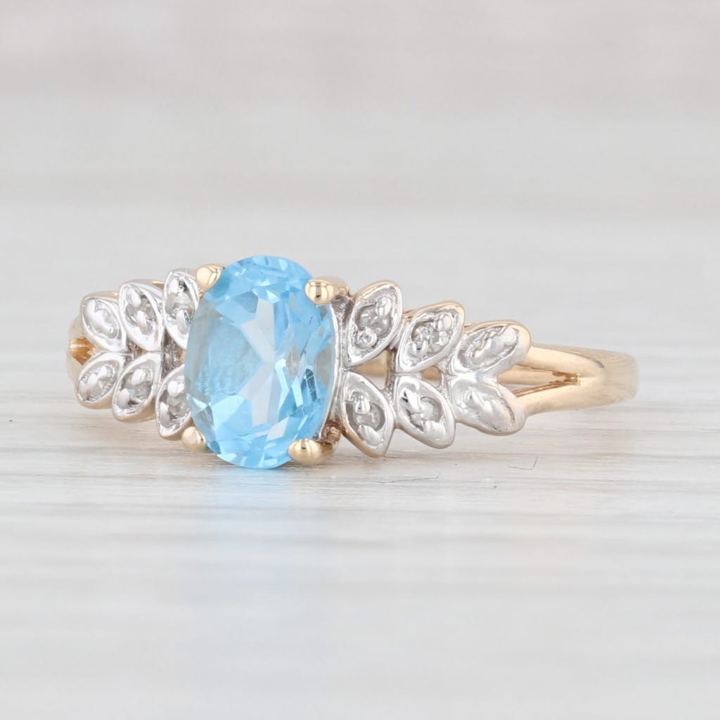 Light Gray 0.99ctw Oval Blue Topaz Diamond Ring 14k Yellow Gold Size 7