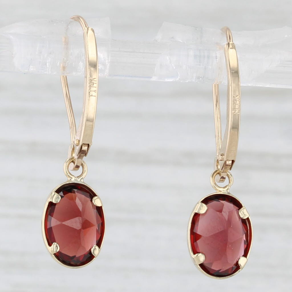 Light Gray 1.80ctw Oval Garnet Drop Earrings 14k Yellow Gold Lever Backs