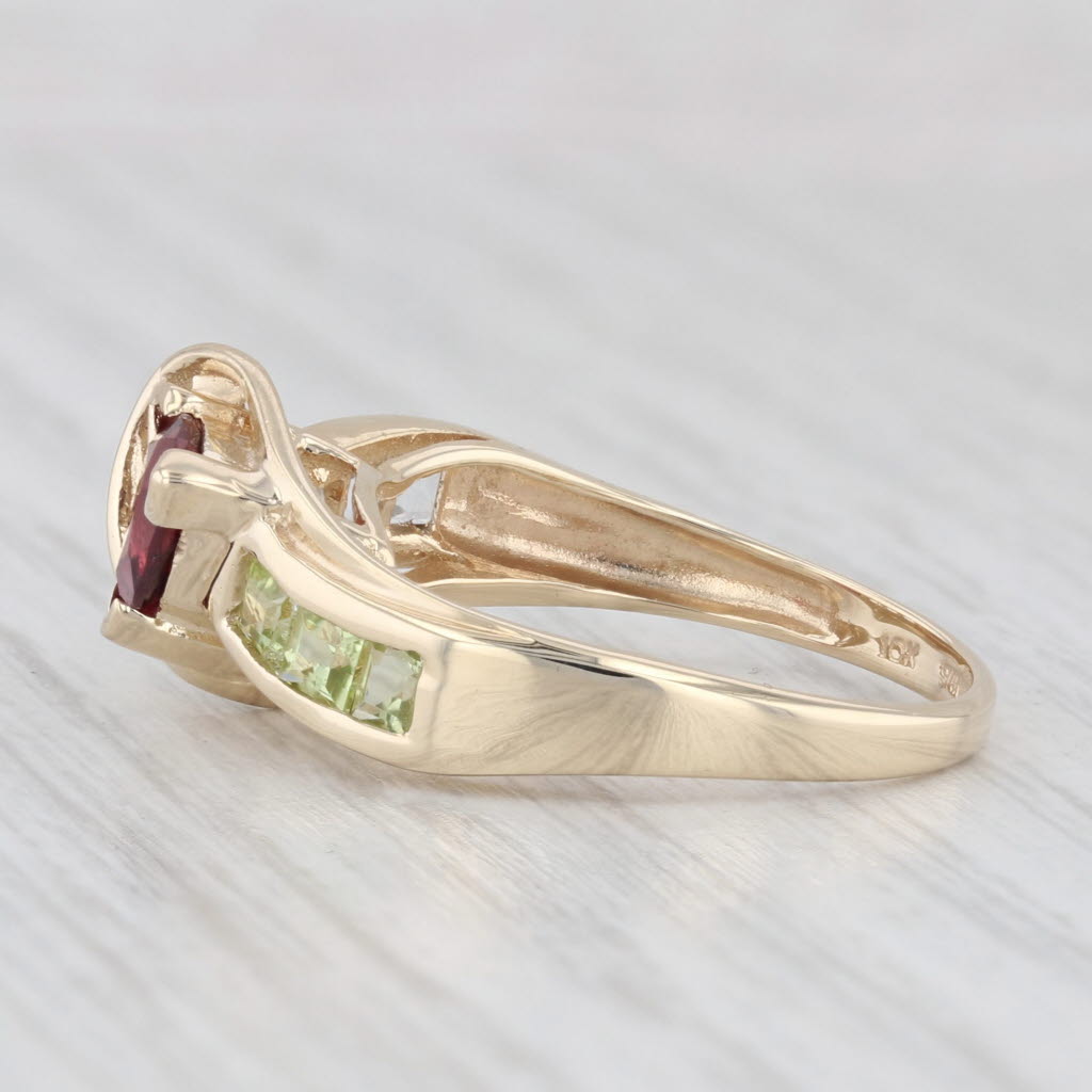 Light Gray 1.11ctw Garnet Peridot Topaz Bypass Ring 10k Yellow Gold Size 6.75