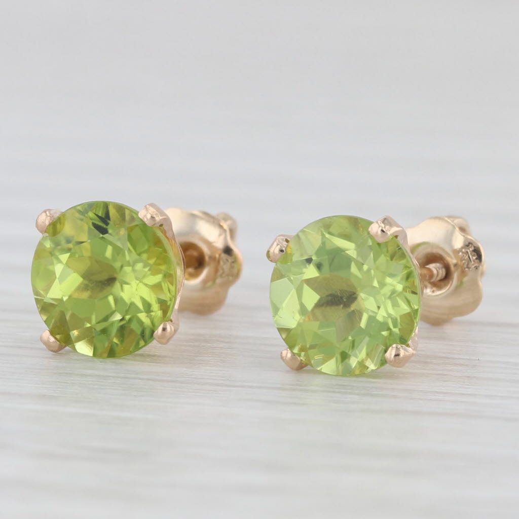 Light Gray 2.80ctw Green Peridot Stud Earrings 14k Yellow Gold Round Solitaires