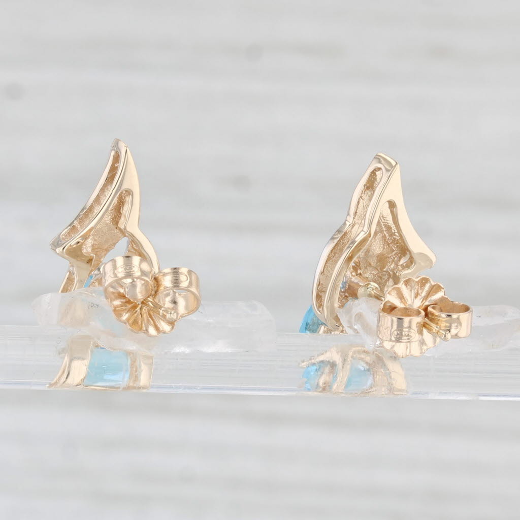 Light Gray 1.60ctw Pear Blue Topaz Diamond Stud Earrings 10k Yellow Gold Diamond Accents