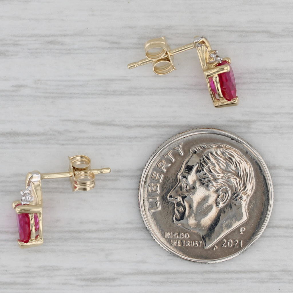 Gray 1.20ctw Lab Created Ruby Heart Stud Earrings 10k Yellow Gold