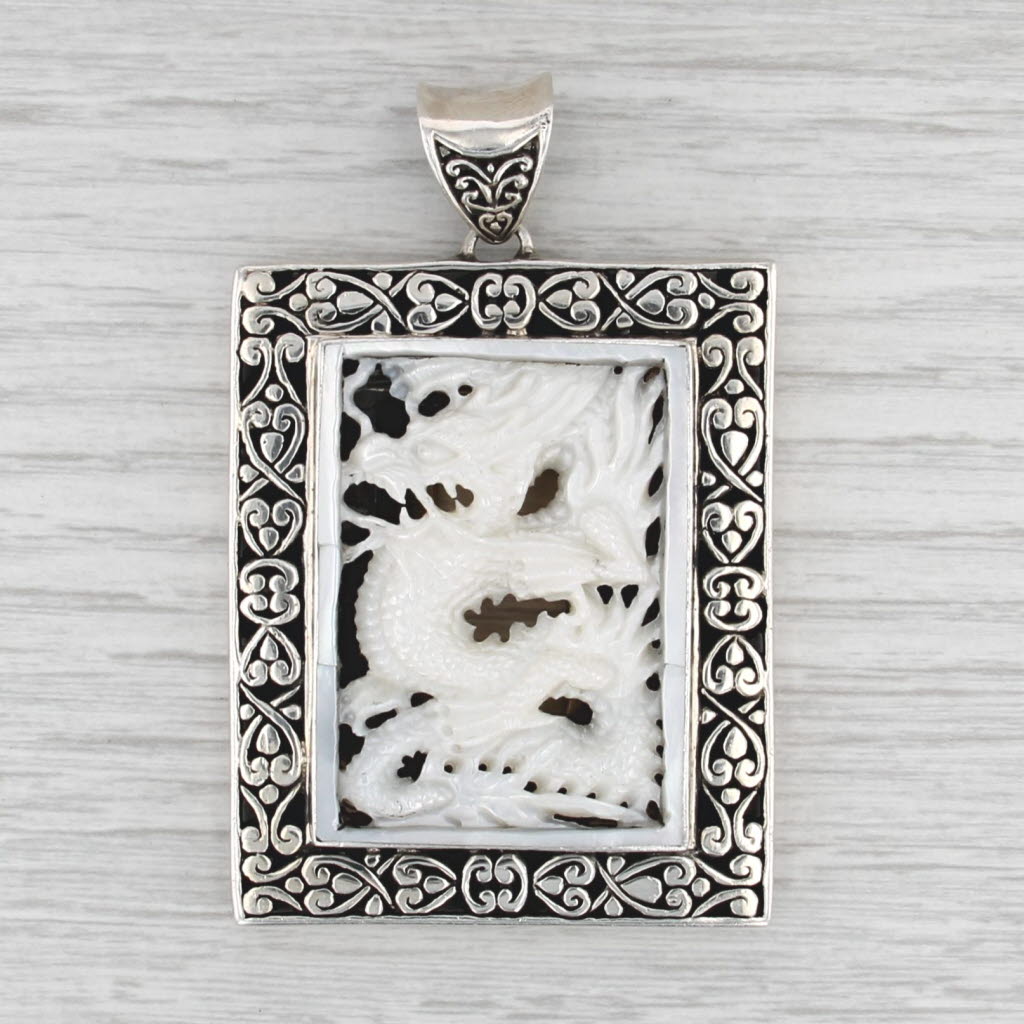 Milo Carved Mother of Pearl Dragon Ornate Frame Pendant Sterling Silver