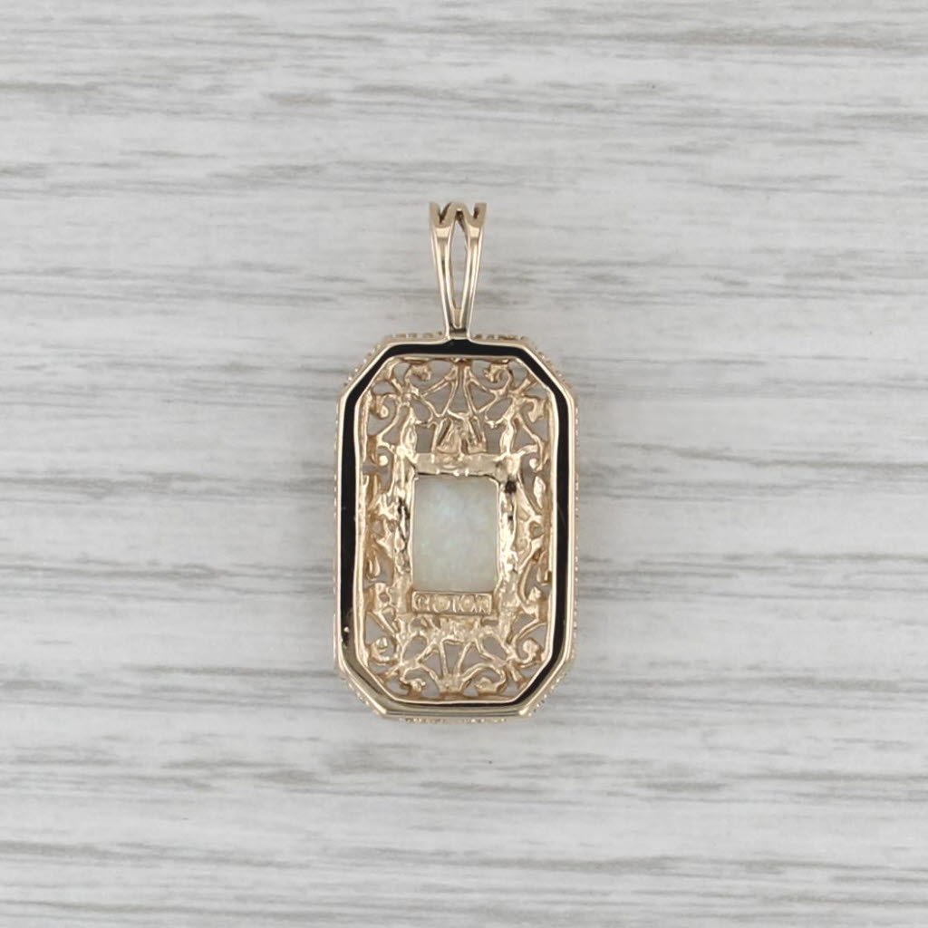Ornate Openwork Opal Cabochon Pendant 10k Yellow Gold